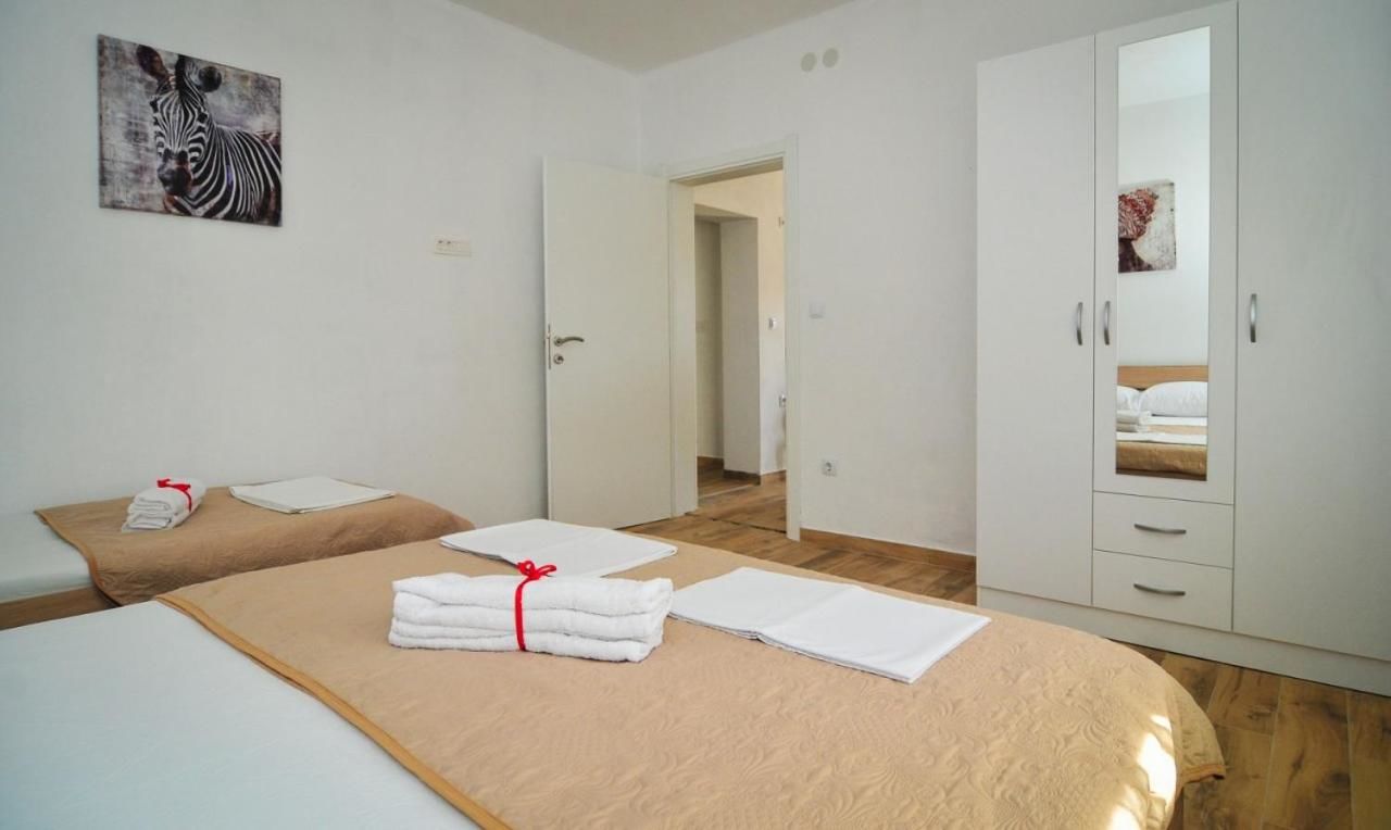 Гостевой дом Apartmani Bekonja Тиват-19